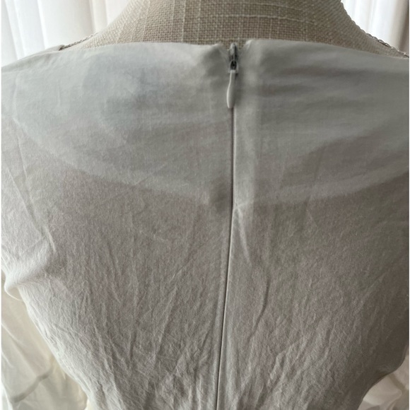 2 beautiful shirts. White shirt with bell sleeves the buckle shirt size small - Picture 4 of 9